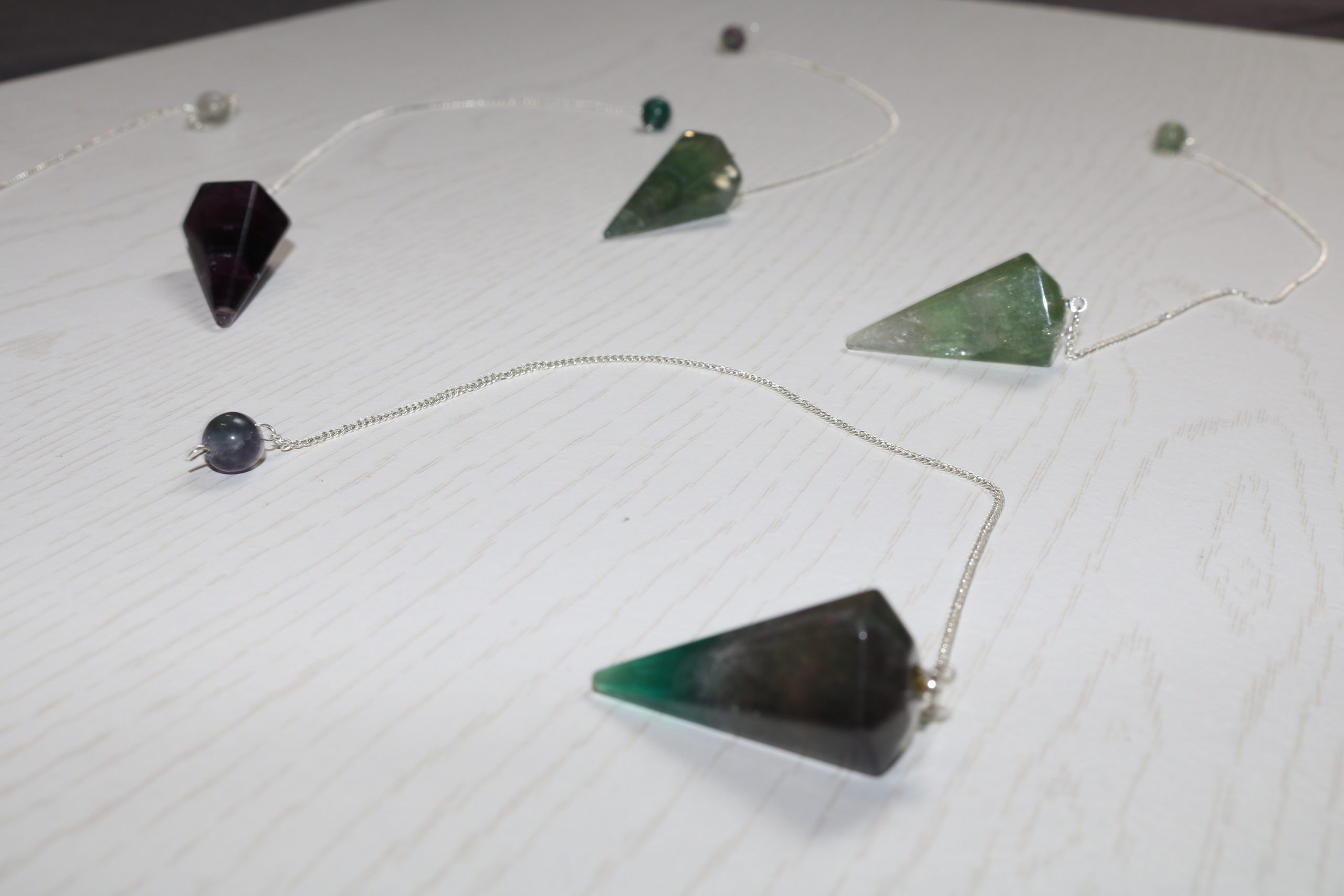 pendule fluorine violet vert