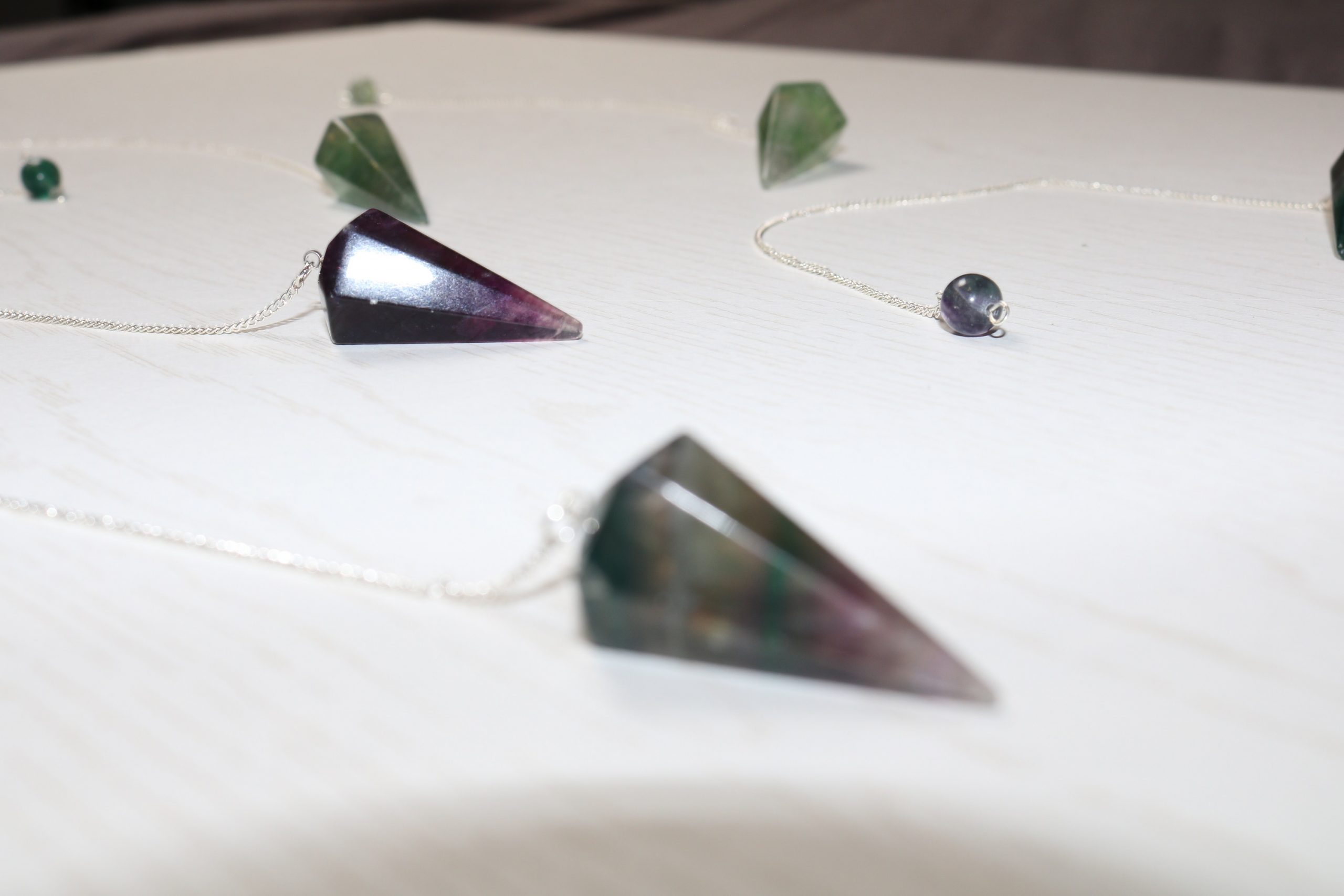 pendule fluorine violet vert